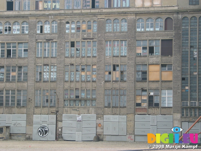 25005 Writing on windows of abandoned building